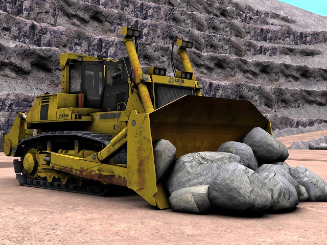 Bulldozer loads stones